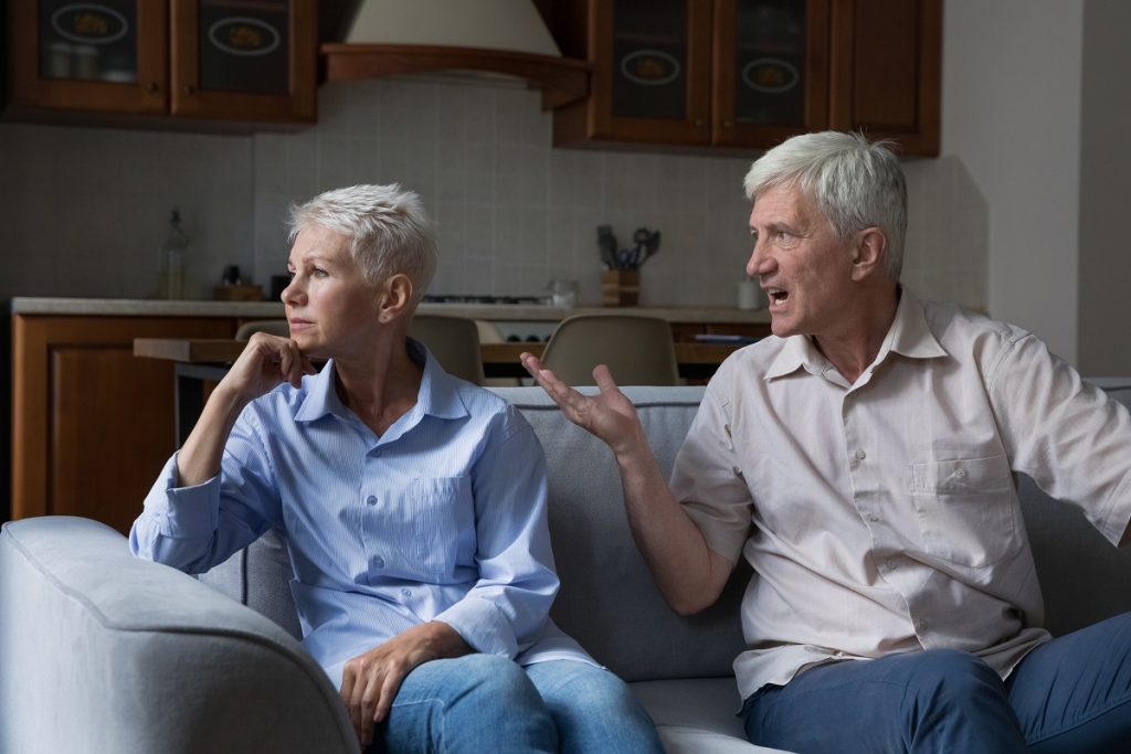 Senior yelling at depessed wife