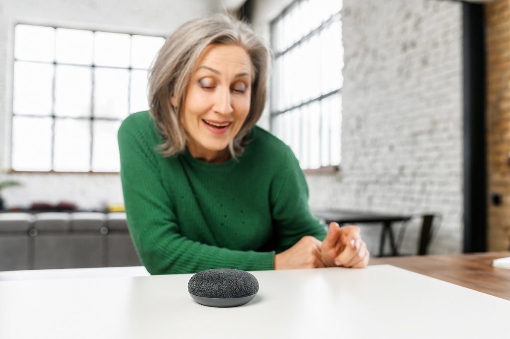 Woman using Echo Dot