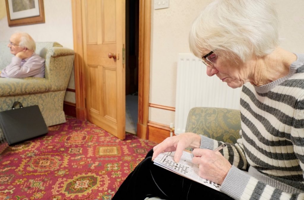 Senior playing word games