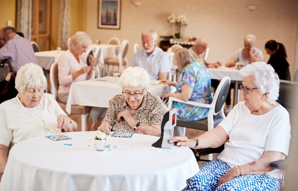Seniors playing bingo at nursing home