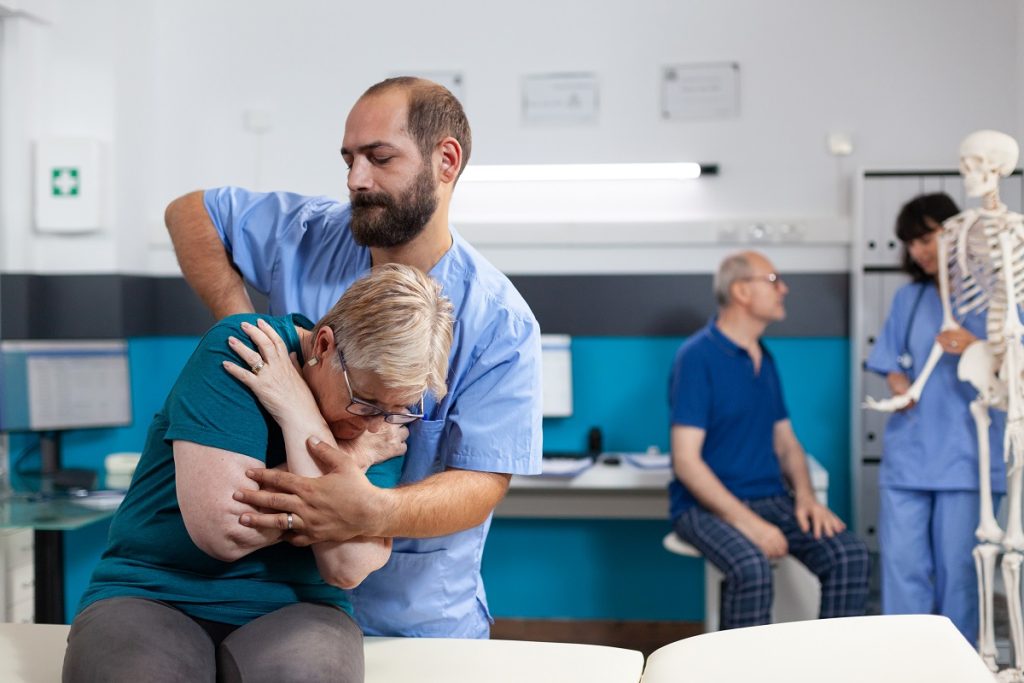 Chiropractor cracks elderly woman's back